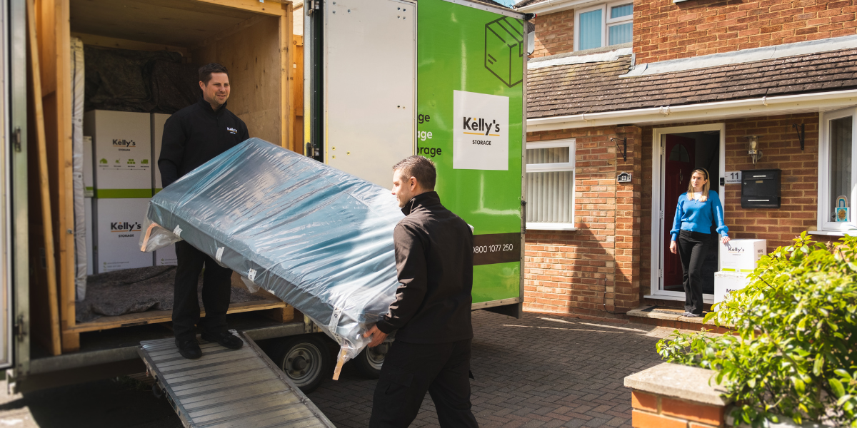 self storage van being loaded with carefully wrapped items